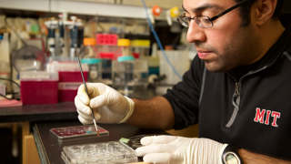 Steve Ramirez works in his lab.