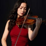 Lucia Micarelli plays her violin.