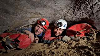 Robbie Shone goes caving with a friend.