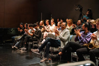 Stanley Clarke and students applaud a performance