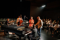 Stanley Clarke gives feedback to students