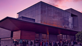 An exterior shot of BroadStage in the evening