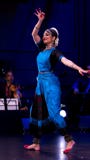 Ashwini Ramaswamy dances onstage.
