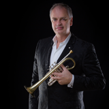Jens Lindemann holds a trumpet