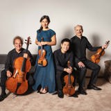 Takacs Quartet holds their instruments together