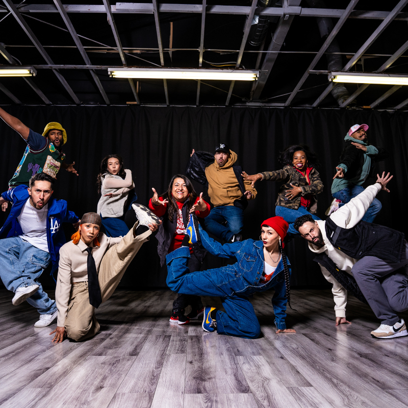 The Versa-Style Street Dance Company poses in a dance studio.
